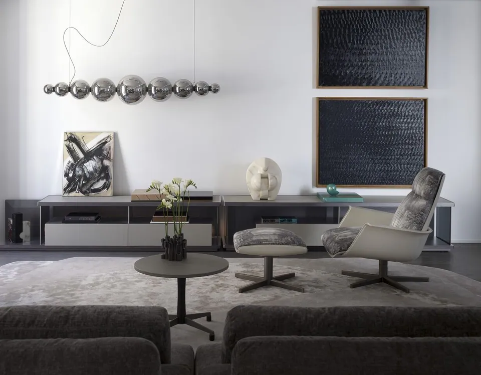 Giorgetti Clori swivel armchair with armrests, photographed for the catalogue