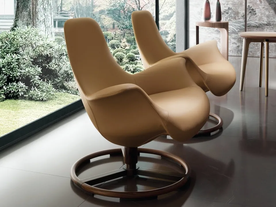 Giorgetti Tilt swivel fabric armchair with armrests, photographed for the catalogue