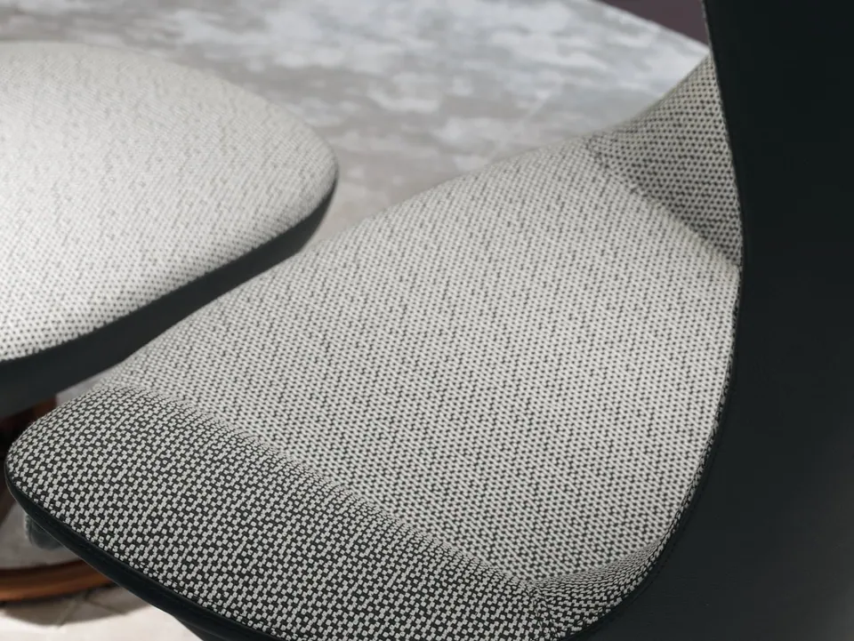 Giorgetti Tilt swivel fabric armchair with armrests, photographed for the catalogue