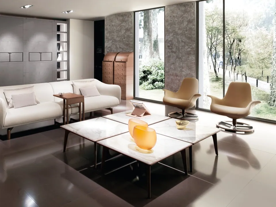 Giorgetti Tilt swivel fabric armchair with armrests, photographed for the catalogue